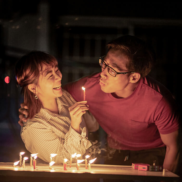 Happy couple having a birthday celebration