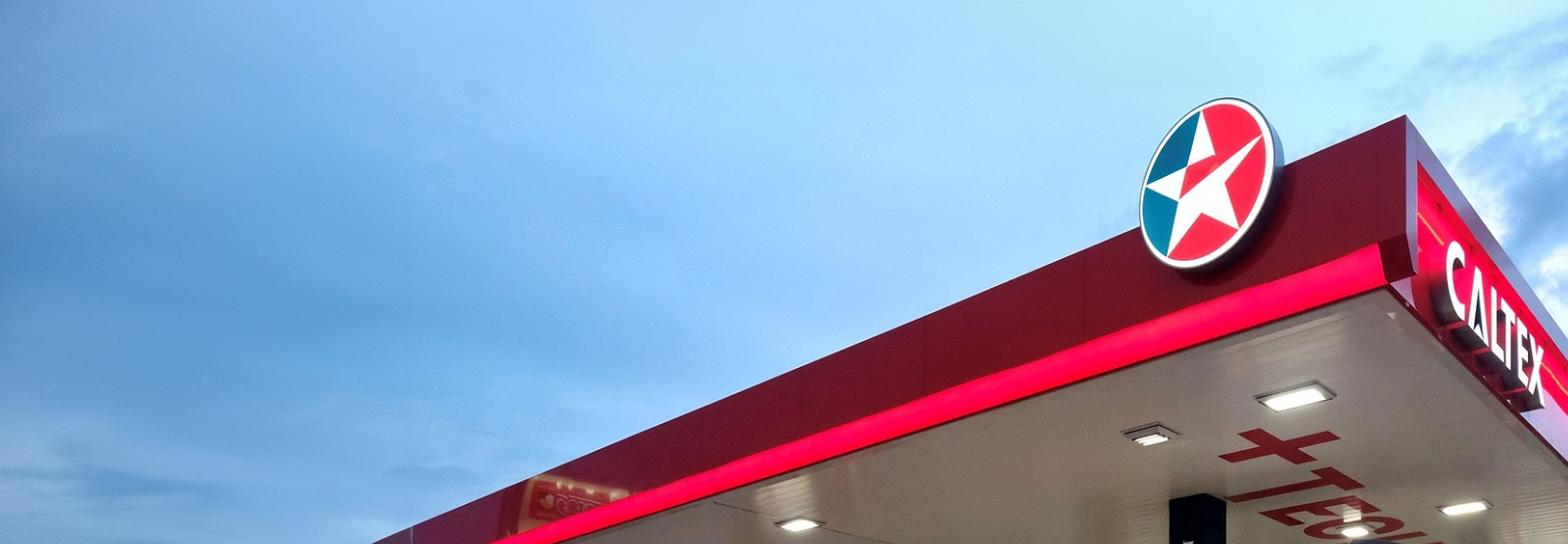 Roof of a Caltex station against a blue sky