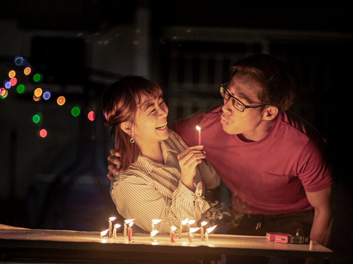 Happy couple having a birthday celebration